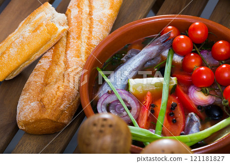Fisherman's hoosh boiled with poutassou, small sea fish, tomatoes 121181827