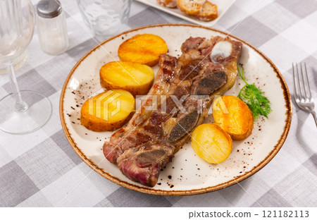 Spanish Churrasco - grilled veal served with broiled sweet pepper and potato 121182113