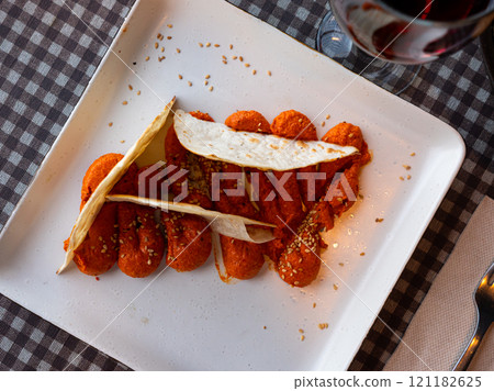 Muhamara - cream of hot pepper and walnut with Arabic bread 121182625