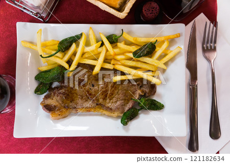Top view of beef steak with side dish 121182634