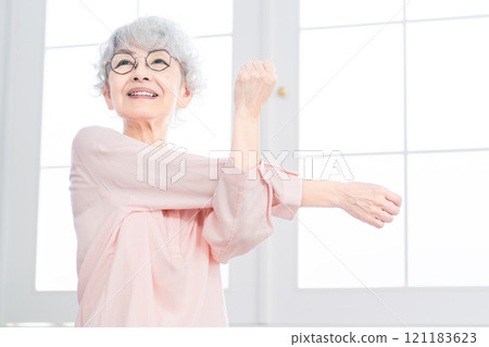 Senior woman stretching Senior woman stretching 121183623