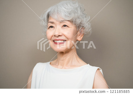 Senior woman wearing sleeveless top Beauty image 121185885