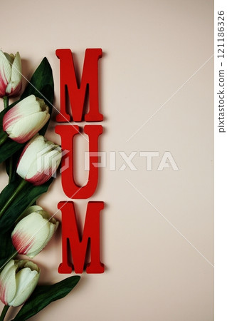 Happy Mother's day theme with MOM letters and flowers decoration on pink background 121186326