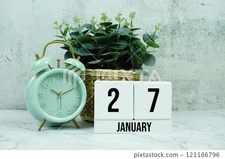 Wooden Calendar Showing the Date of January 27th. Day 27 of January month 121186796