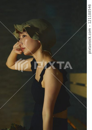 A woman taking a sauna. Photo courtesy of Shiratama no Yu Izumikei. A woman taking a sauna. Photo courtesy of Shiratama no Yu Izumikei. 121188546