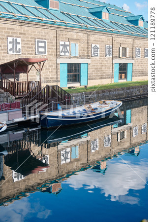 Otaru Canal - Historic warehouses and their reflections on the water 121189778