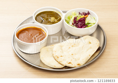 Curry and naan lunch plate Curry and naan lunch plate 121189833