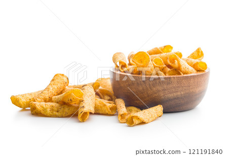 Rolled nachos tortilla chips in boowl isolated on white background. Rolled nachos tortilla chips in boowl isolated on white background. 121191840