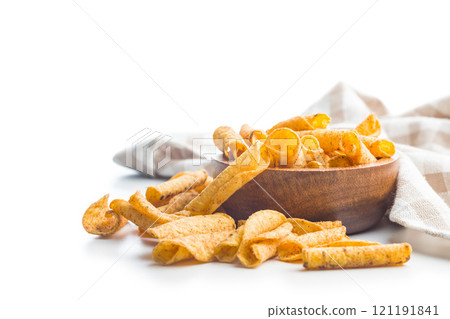 Rolled nachos tortilla chips isolated on white background. Rolled nachos tortilla chips isolated on white background. 121191841