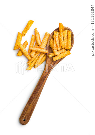 Rolled nachos tortilla chips on spoon isolated on white background. Rolled nachos tortilla chips on spoon isolated on white background. 121191844