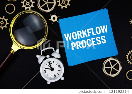 Workflow Process text message on sticky note with magnifying glass and alarm clock on black background 121192214