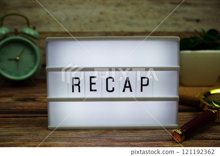 RECAP letterboard text on LED Lightbox on wooden background, business and communication concept background 121192362