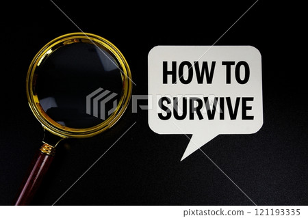 How to survive text on speech bubble with magnifying glass top view on black background 121193335