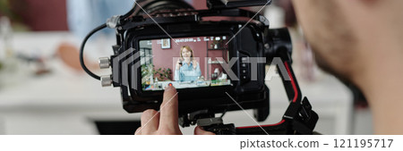 Website banner with unrecognizable operator shooting woman in commerce of cosmetic products Website banner with unrecognizable operator shooting woman in commerce of cosmetic products 121195717