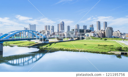 Cityscape of Kawasaki: Marukobashi Bridge over the Tama River and the tower apartment complexes of Musashi-Kosugi [Kawasaki City, Kanagawa Prefecture] 121195756