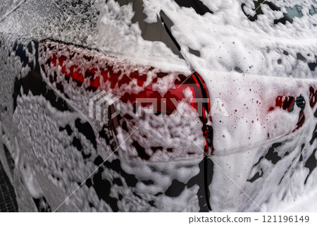 SUV Being Washed at Car Wash 121196149