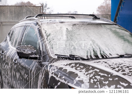 SUV Being Washed at Car Wash SUV Being Washed at Car Wash 121196181