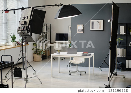 Empty studio fully equipped with electronic devices and furniture for video production Empty studio fully equipped with electronic devices and furniture for video production 121196318