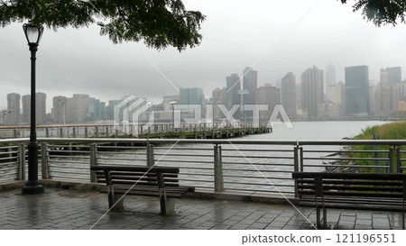 New York City waterfront skyline, Manhattan Midtown riverfront skyscrapers. Cityscape from Queens. New York City waterfront skyline, Manhattan Midtown riverfront skyscrapers. Cityscape from Queens. 121196551