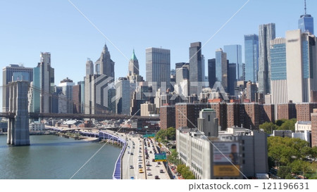 Brooklyn Bridge from Manhattan Bridge. New York City downtown skyline, financial district cityscape. 121196631