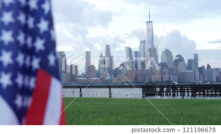 New York City waterfront skyline, Manhattan Downtown World Trade Center cityscape. American USA flag New York City waterfront skyline, Manhattan Downtown World Trade Center cityscape. American USA flag 121196678
