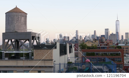 New York City Manhattan downtown skyline cityscape. World Trade Center, rooftop water tower tank. 121196704