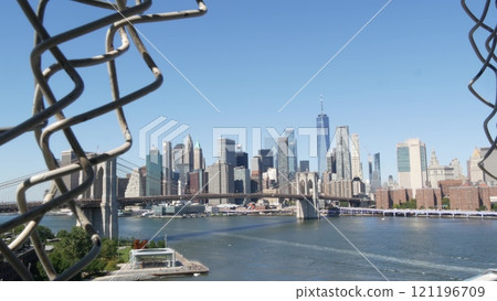 Brooklyn Bridge from Manhattan Bridge. New York City downtown skyline, financial district cityscape. 121196709