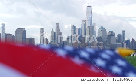 New York City waterfront skyline, Manhattan Downtown World Trade Center cityscape. American USA flag New York City waterfront skyline, Manhattan Downtown World Trade Center cityscape. American USA flag 121196806