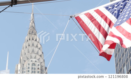 New York, american flag waving. Chrysler building. Manhattan midtown city street banner, patriotism. New York, american flag waving. Chrysler building. Manhattan midtown city street banner, patriotism. 121196808
