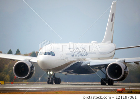 A passenger plane taking off (accelerating) A passenger plane taking off (accelerating) 121197061