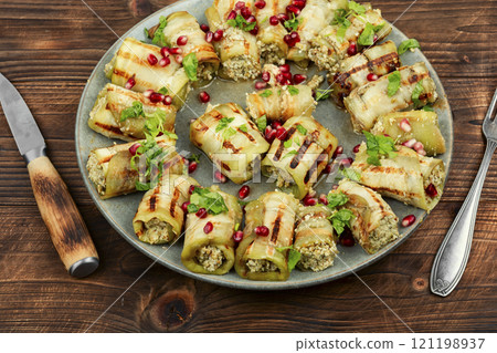 Delicious stuffed eggplant rolls. Delicious stuffed eggplant rolls. 121198937