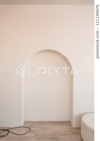 Minimalist Interior with Arched Niche and Neutral Tones Minimalist Interior with Arched Niche and Neutral Tones 121198976