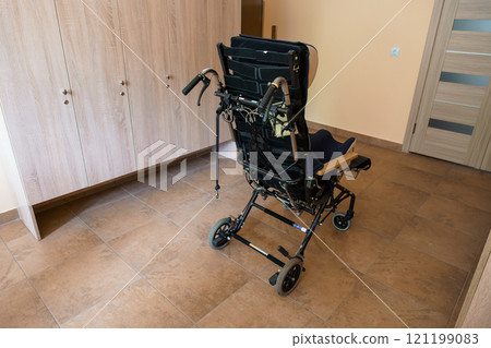 Modern Wheelchair in a Spacious Room Modern Wheelchair in a Spacious Room 121199083