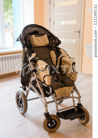 Modern Versatile Baby Stroller with Adjustable Features in Cozy Indoor Setting 121199132