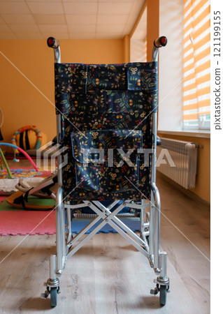 Floral Print Folding Wheelchair in a Cheerful Room Setting Floral Print Folding Wheelchair in a Cheerful Room Setting 121199155