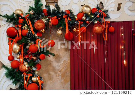 Festive Red and Gold Christmas Garland Decoration with Ornaments and Ribbons 121199212