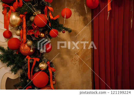 Festive Holiday Decor with Red Ornaments and Greenery Festive Holiday Decor with Red Ornaments and Greenery 121199224