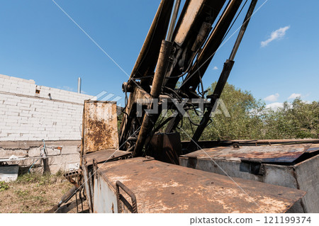Industrial Machinery Against a Clear Blue Sky Industrial Machinery Against a Clear Blue Sky 121199374