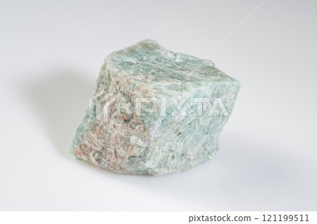 Natural Amazonite Gemstone Displaying Vibrant Green and Blue Shades with Unique Texture 121199511