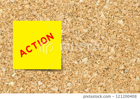 Yellow note paper with word action on cork board background with copy space Yellow note paper with word action on cork board background with copy space 121200408