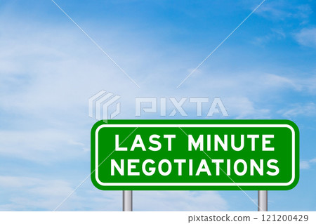 Green color transportation sign with word last minute negotiations on blue sky with white cloud background 121200429