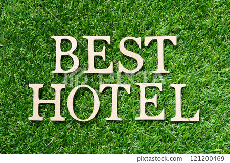 Wood alphabet letter in word best hotel on artificial green grass background Wood alphabet letter in word best hotel on artificial green grass background 121200469