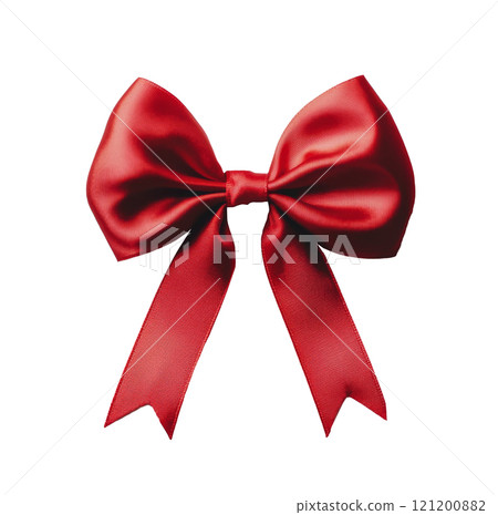 Bright red ribbon bow placed elegantly on a white surface for gift decorating 121200882