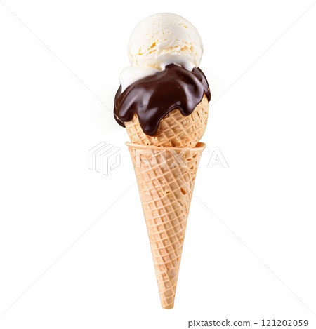 Delicious vanilla ice cream topped with syrup in a waffle cone served on a sunny day 121202059