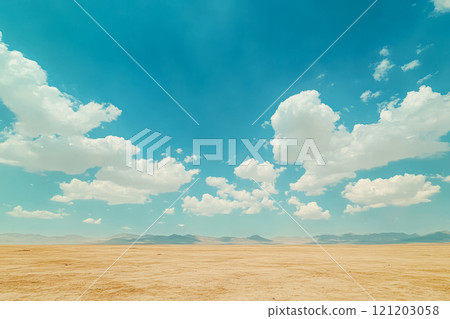 Vast desert landscape under a bright blue sky with fluffy clouds 121203058