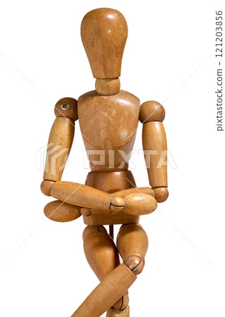 Wooden dummy posing against white background Wooden dummy posing against white background 121203856