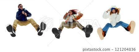 Group of fashionable young adults people, man and woman, dynamically posing against white background. Bottom view. Group of fashionable young adults people, man and woman, dynamically posing against white background. Bottom view. 121204836