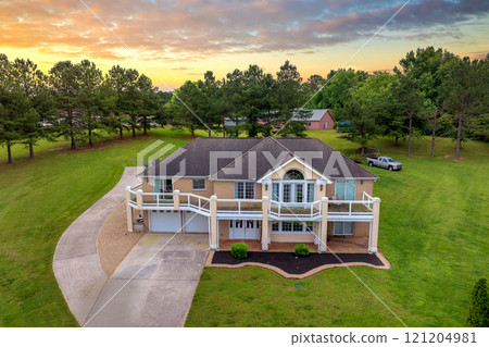 Wealthy residential area in USA suburbs. Rich neighborhood with expensive suburban homes in Kingston, Tennessee Wealthy residential area in USA suburbs. Rich neighborhood with expensive suburban homes in Kingston, Tennessee 121204981
