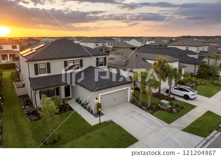 Wealthy neighborhood with expensive houses in southern Florida. Development of US premium housing market Wealthy neighborhood with expensive houses in southern Florida. Development of US premium housing market 121204987