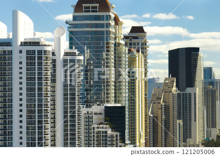 View from above of luxurious highrise hotels and condos on Atlantic ocean shore in Sunny Isles Beach city. American tourism infrastructure in southern Florida 121205006